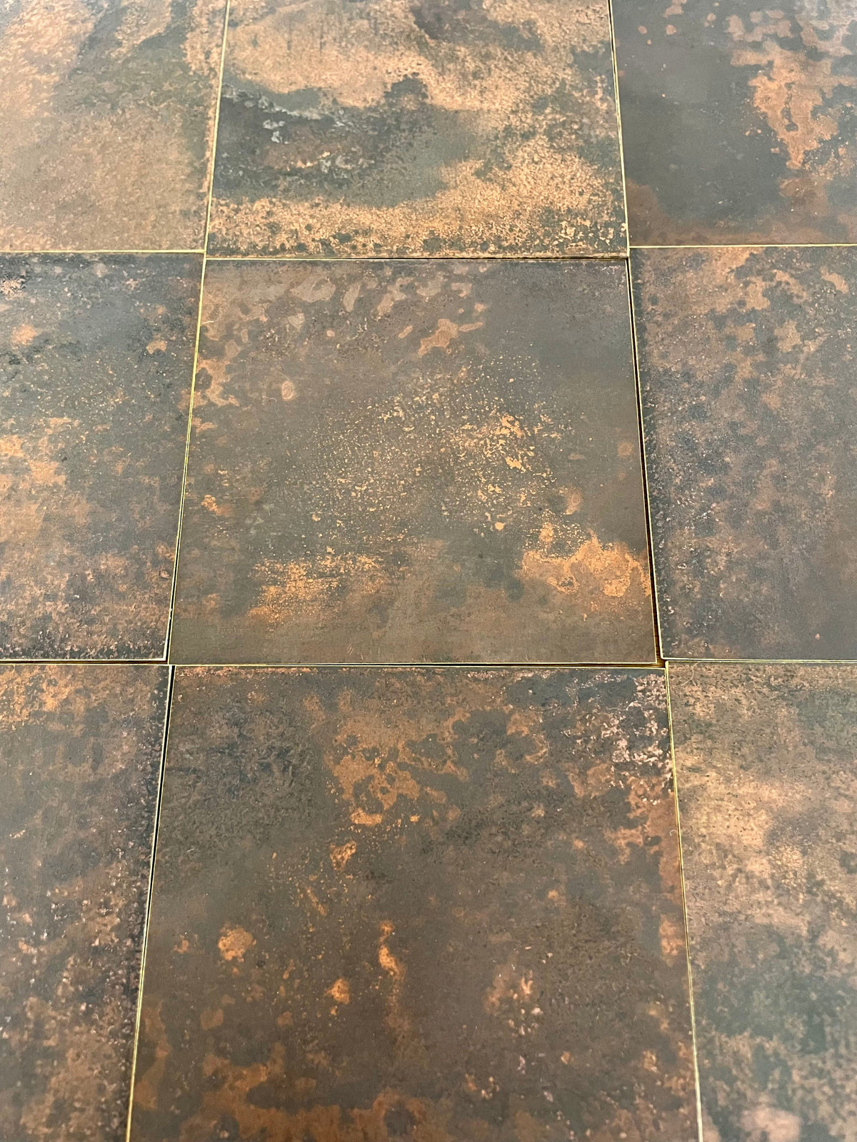 Dark Mottled Copper patinated brass by Metal Clad