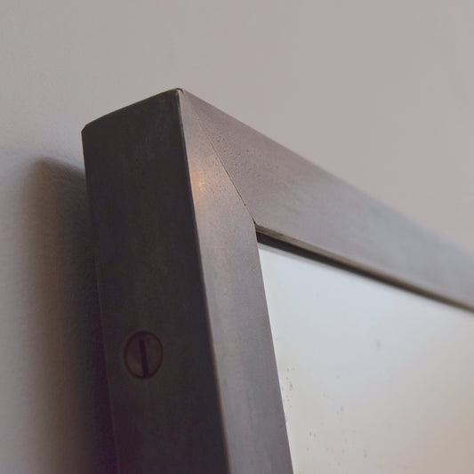 Steel angle framed antiqued mirror by Rough Old Glass
