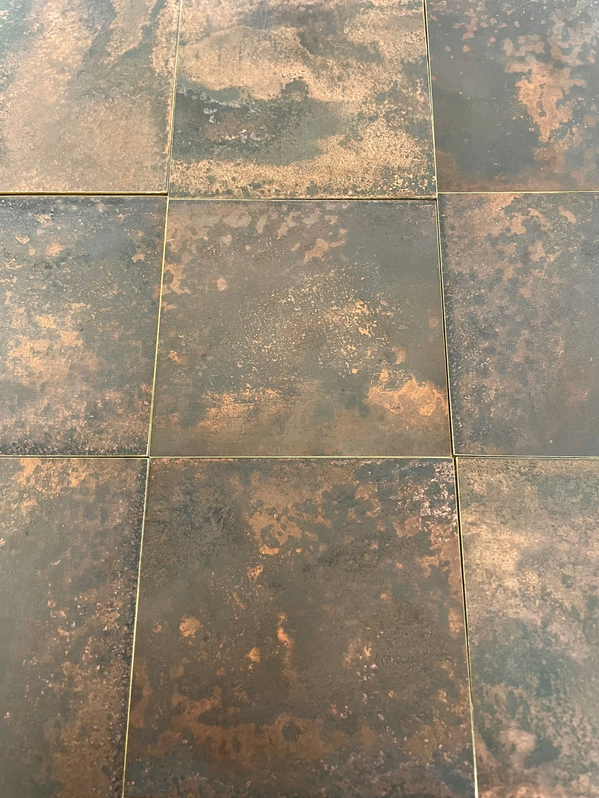 Dark Mottled Copper patinated brass by Metal Clad