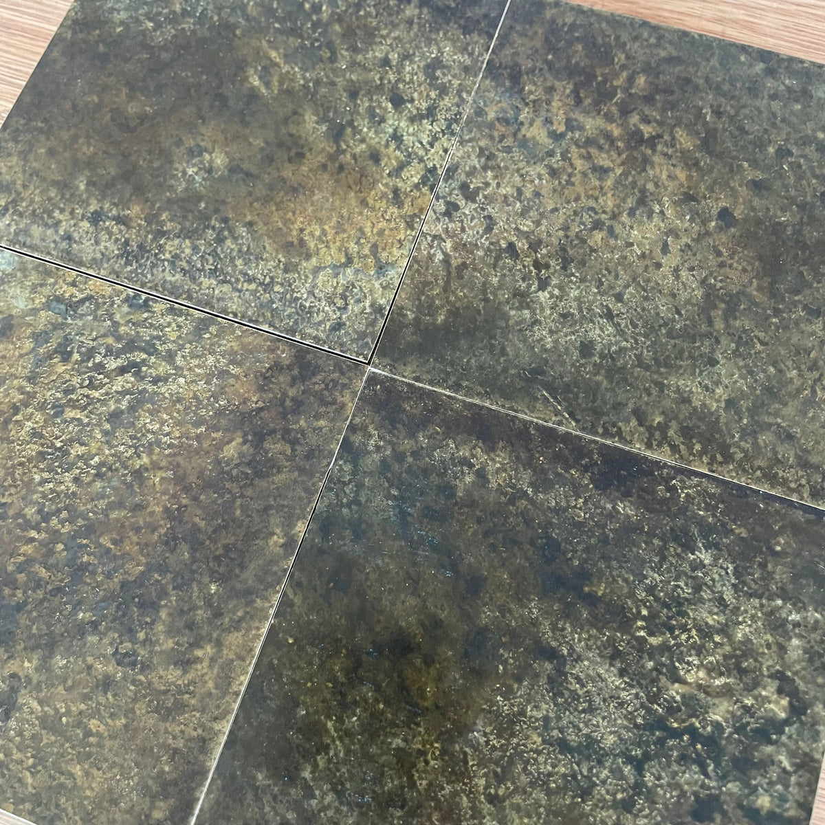 Fossil Antiqued Brass patinated finish by Metal Clad