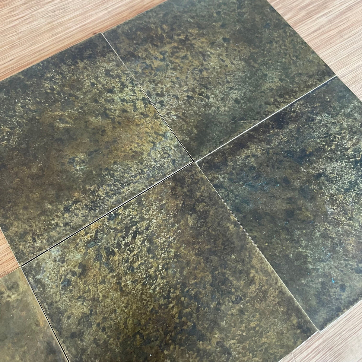 Fossil Antiqued Brass patinated brass by Metal Clad