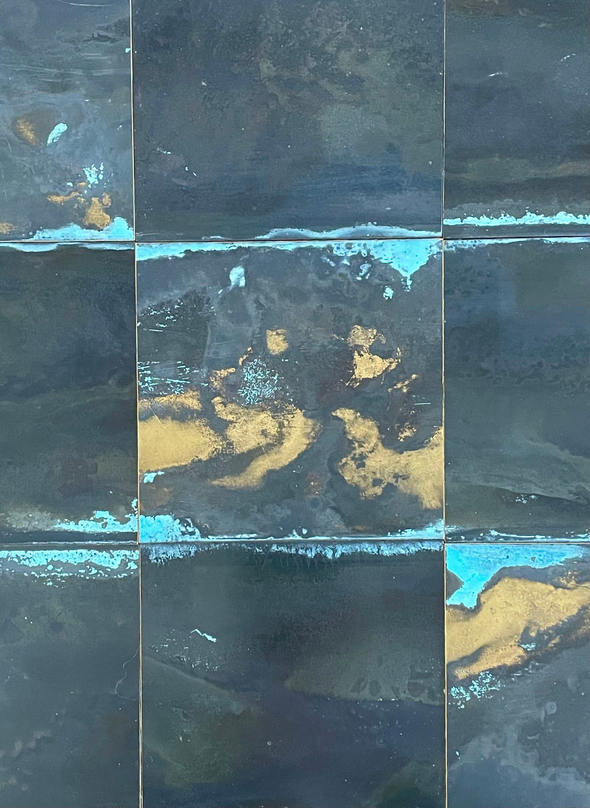 Inky Brass with Blue Bloom patinated finish by Metal Clad