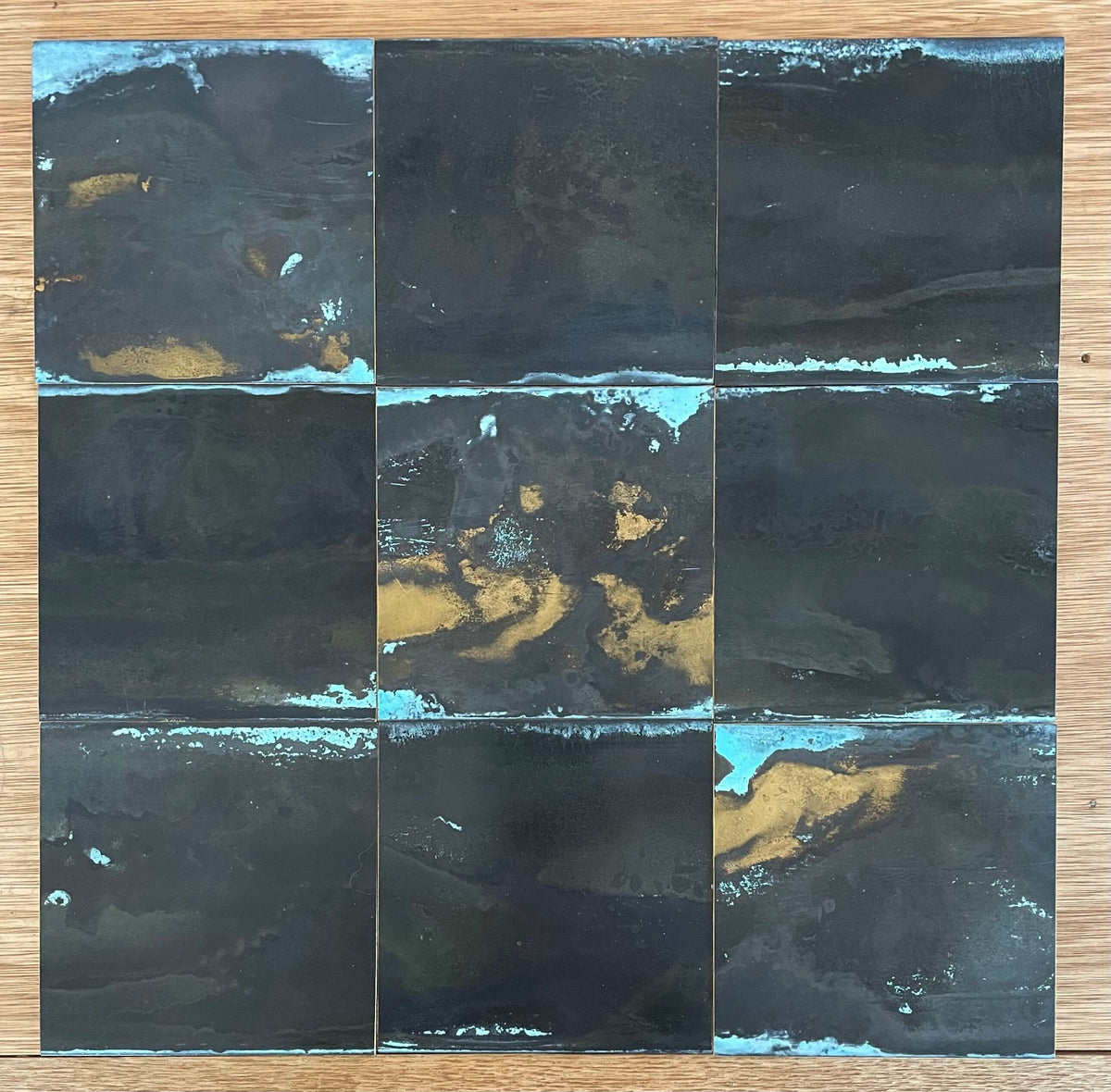 Inky Brass with Blue Bloom patinated finish by Metal Clad
