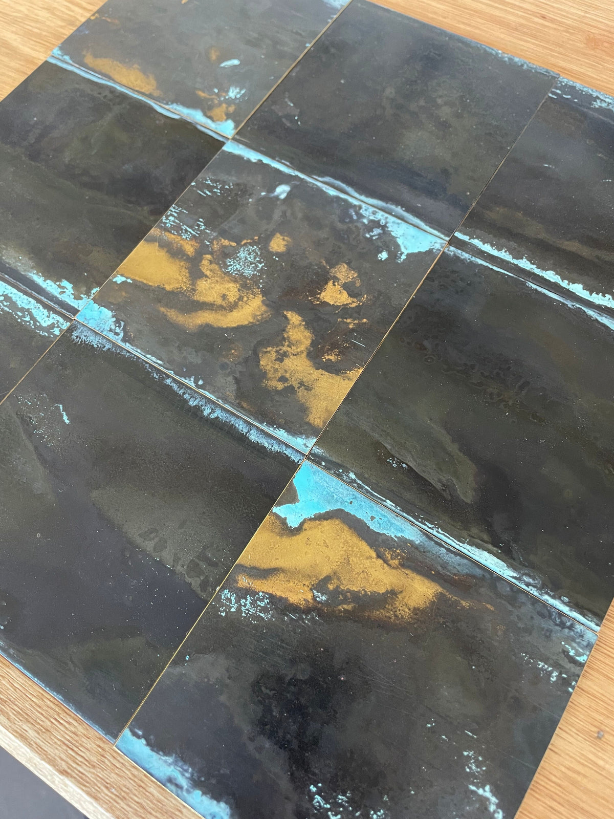 Inky Brass with Blue Bloom patinated finish by Metal Clad
