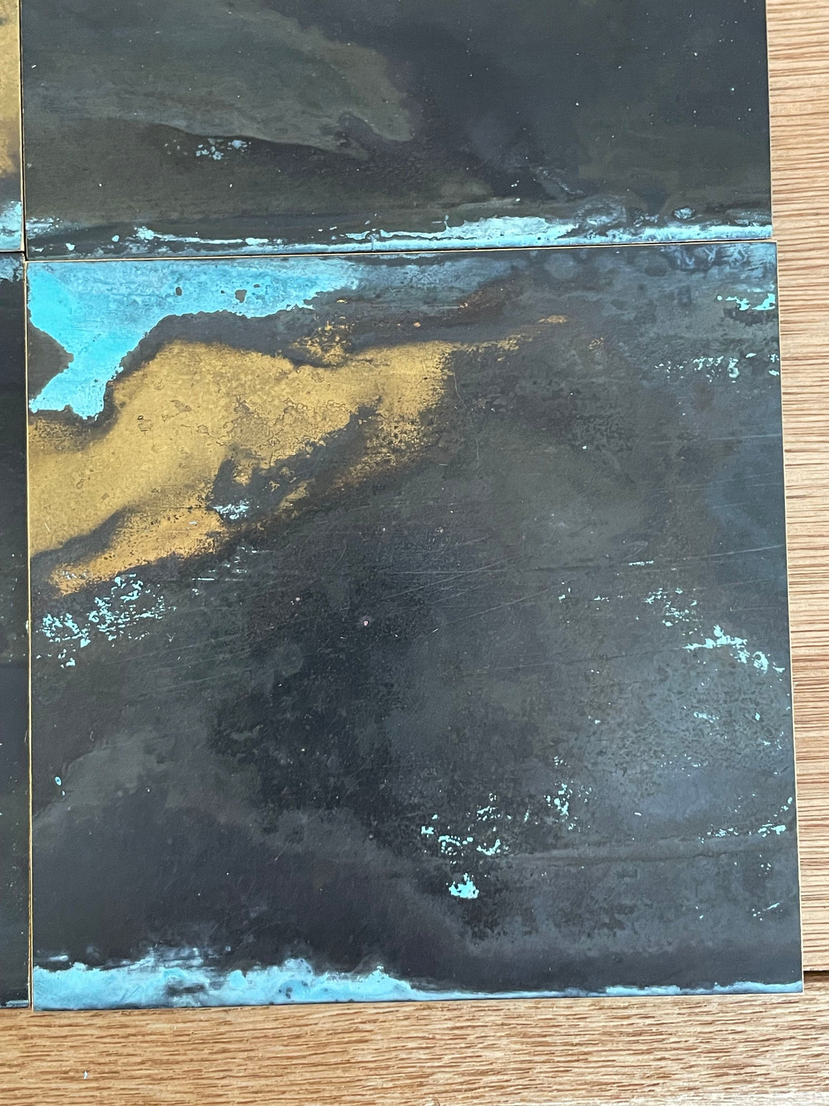 Inky Brass with Blue Bloom patinated brass by Metal Clad