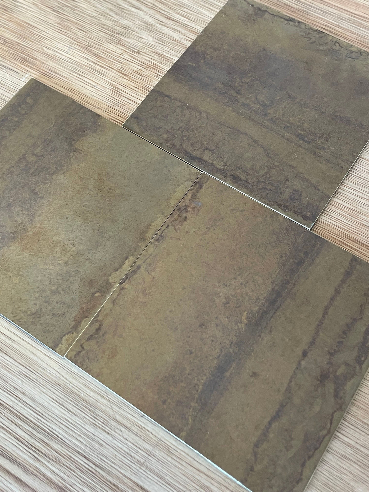 Marbled Edge Antiqued Brass patinated finish by Metal Clad