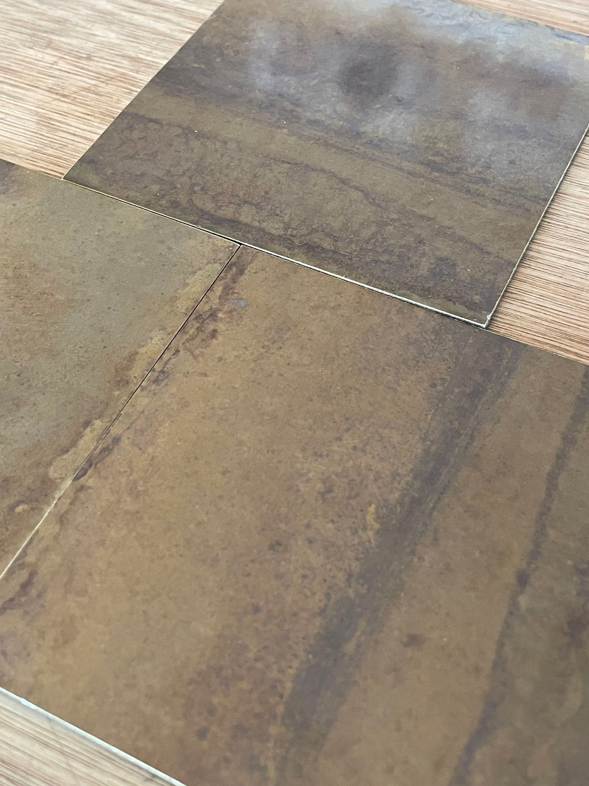 Marbled Edge Antiqued Brass patinated finish by Metal Clad